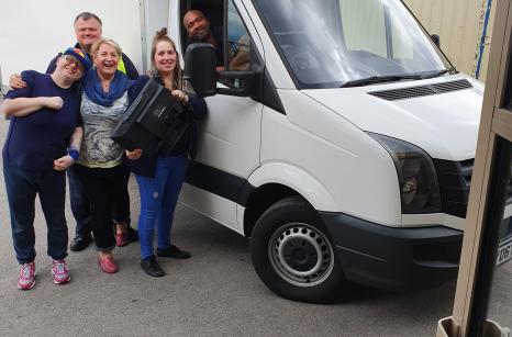 Volunteers loading the van