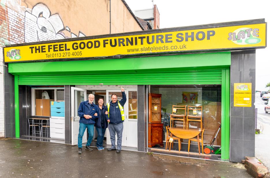 Team members outside the shop front